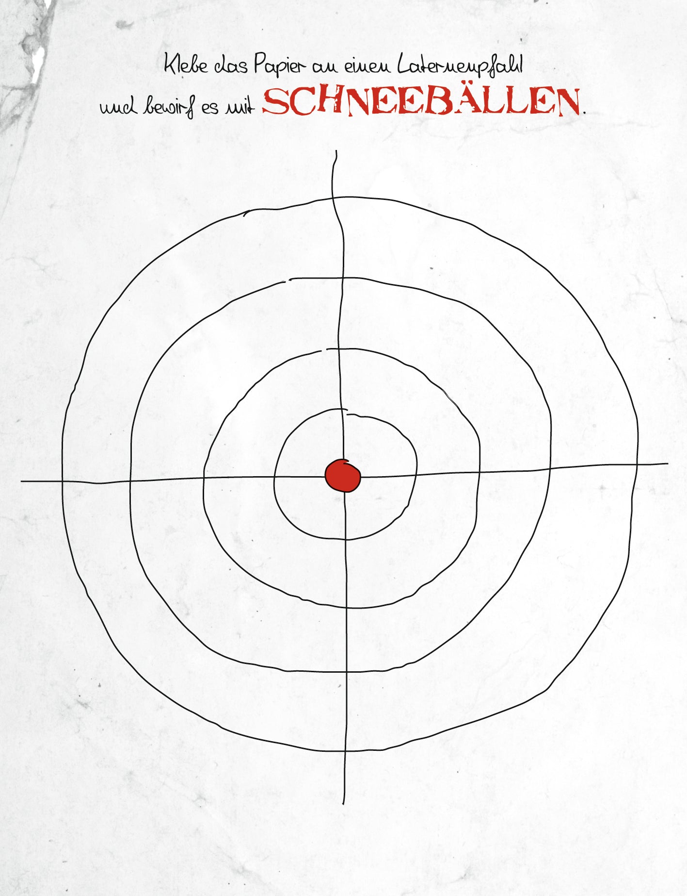 Gezeigt wird eine Innen- oder Zusatzansicht von „Gib diesem Adventskalender den Rest!“. Die Abbildung zeigt eine Zielscheibe mit mehreren konzentrischen Kreisen, die in Schwarz gezeichnet sind. In der Mitte befindet sich ein roter Punkt. Oben ist eine handschriftliche Anweisung in roter Schrift platziert, die den Text „Klebe das Papier an einen Laternenpfahl und bewerfe es mit SCHNEEBALLEN“ enthält. Der Hintergrund ist weiß und wirkt schlicht und klar strukturiert.