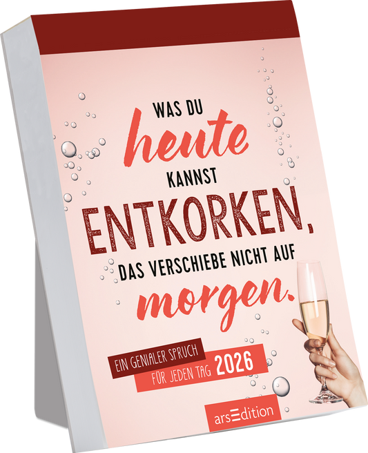 Auf dem Buchcover dominieren sanfte Rosa- und Rottöne. Der Titel „Was du heute kannst entkorken, das verschiebe nicht auf morgen.“ ist groß und ansprechend in kräftigem Rot und geschwungener Schriftart gehalten. Daneben ist eine Hand zu sehen, die ein Glas Sekt hält, begleitet von glitzernden Blasen. Unten steht in kleinerer Schrift „Ein genialer Spruch für jeden Tag 2026“. Oben rechts befindet sich der Hinweis „SPIEGEL-Bestseller“. Ganz unten mittig steht der Logoschriftzug...