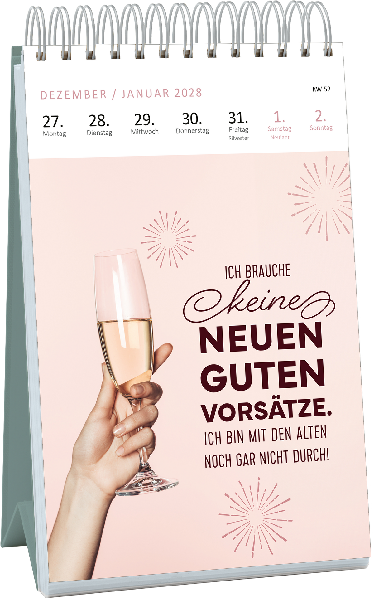 Gezeigt wird eine Innen- oder Zusatzansicht von „Wochenkalender Mir geht’s nicht gut, ich glaub ich hab Montag 2027“. Die Seite präsentiert eine sanft rosa Hintergrundfarbe mit einer Hand, die ein Sektglas hält. In einer dekorativen, geschwungenen Schrift steht „Ich brauche keine neuen guten Vorsätze.“ Darunter folgt die Aussage: „Ich bin mit den alten noch gar nicht durch!“ Die Kombination aus fröhlichen und humorvollen Elementen spiegelt Optimismus wider.