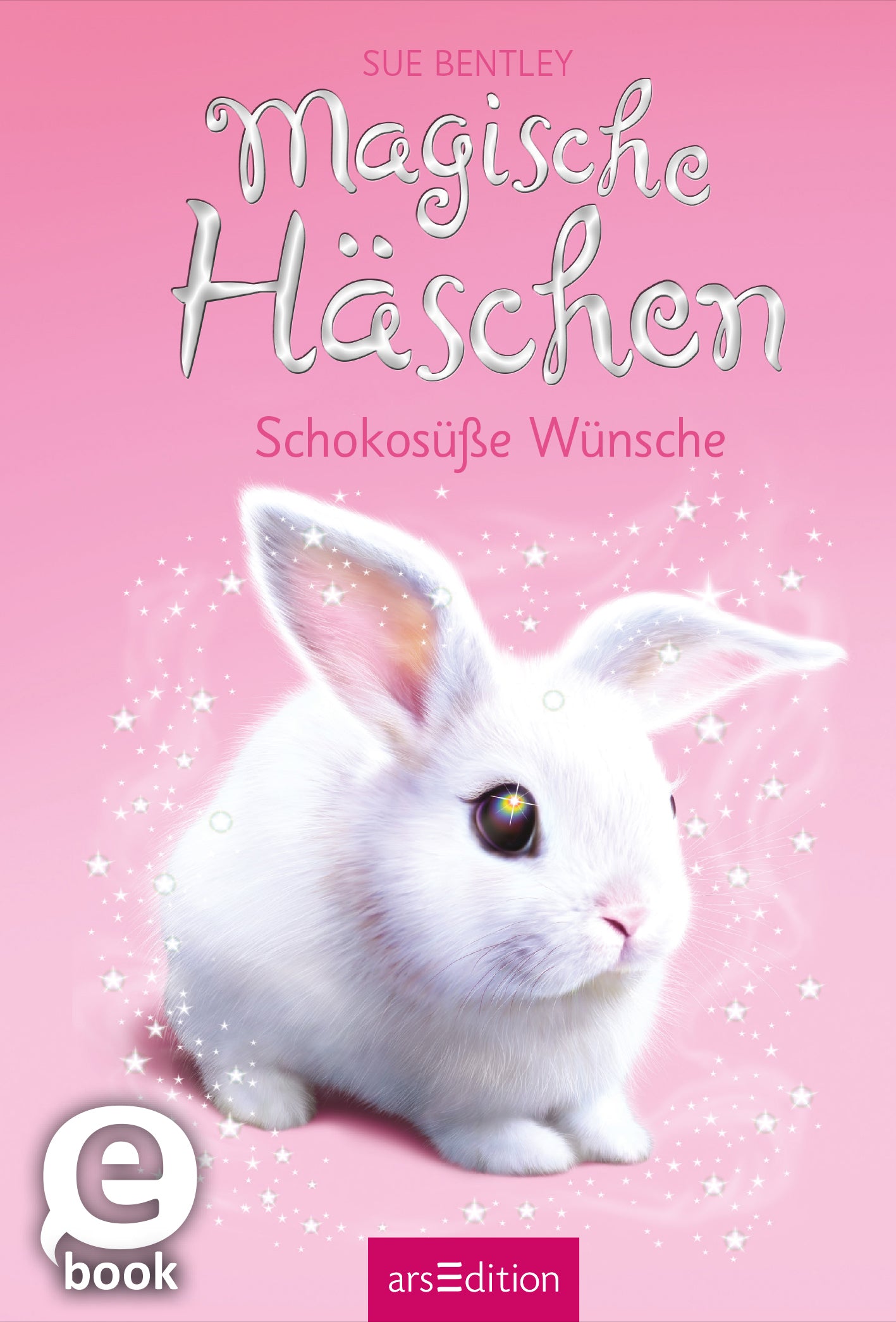 Das Buchcover zeigt ein niedliches, weißes Kaninchen mit großen, glänzenden Augen auf einem sanften rosa Hintergrund. Der Titel „Magische Häschchen“ ist in verspielter, geschwungener Schrift in Weiß gehalten, während der Untertitel „Schokosüße Wünsche“ ebenfalls in eleganter Schrift darunter steht. Funken und glitzernde Sterne umgeben das Kaninchen und verleihen dem Cover eine magische Atmosphäre. In der linken unteren Ecke befindet sich der Button „eBook“. Ganz unten...