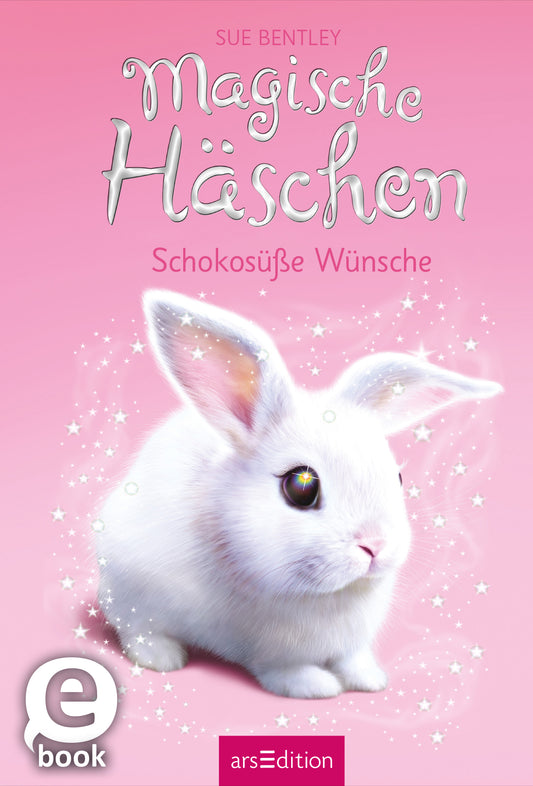 Das Buchcover zeigt ein niedliches, weißes Kaninchen mit großen, glänzenden Augen auf einem sanften rosa Hintergrund. Der Titel „Magische Häschchen“ ist in verspielter, geschwungener Schrift in Weiß gehalten, während der Untertitel „Schokosüße Wünsche“ ebenfalls in eleganter Schrift darunter steht. Funken und glitzernde Sterne umgeben das Kaninchen und verleihen dem Cover eine magische Atmosphäre. In der linken unteren Ecke befindet sich der Button „eBook“. Ganz unten...