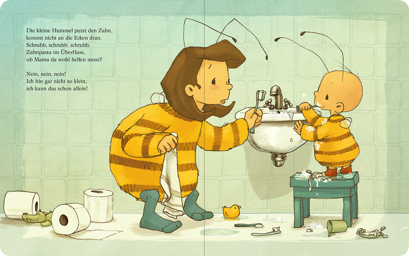 Gezeigt wird eine Innen- oder Zusatzansicht von „Die Baby Hummel Bommel kann das schon alleine“. Die Illustration zeigt eine kindliche Szene im Badezimmer, in der ein kleines Kind und eine Frau in gestreiften Bienenkostümen vor einem Waschbecken stehen. Die Farbpalette ist hell und freundlich, mit sanften Gelbtönen und blauen Akzenten. Der Text ist in einer verspielten, gut lesbaren Schriftart auf der linken Seite platziert, während die Charaktere lächeln und fröhlich interagieren.