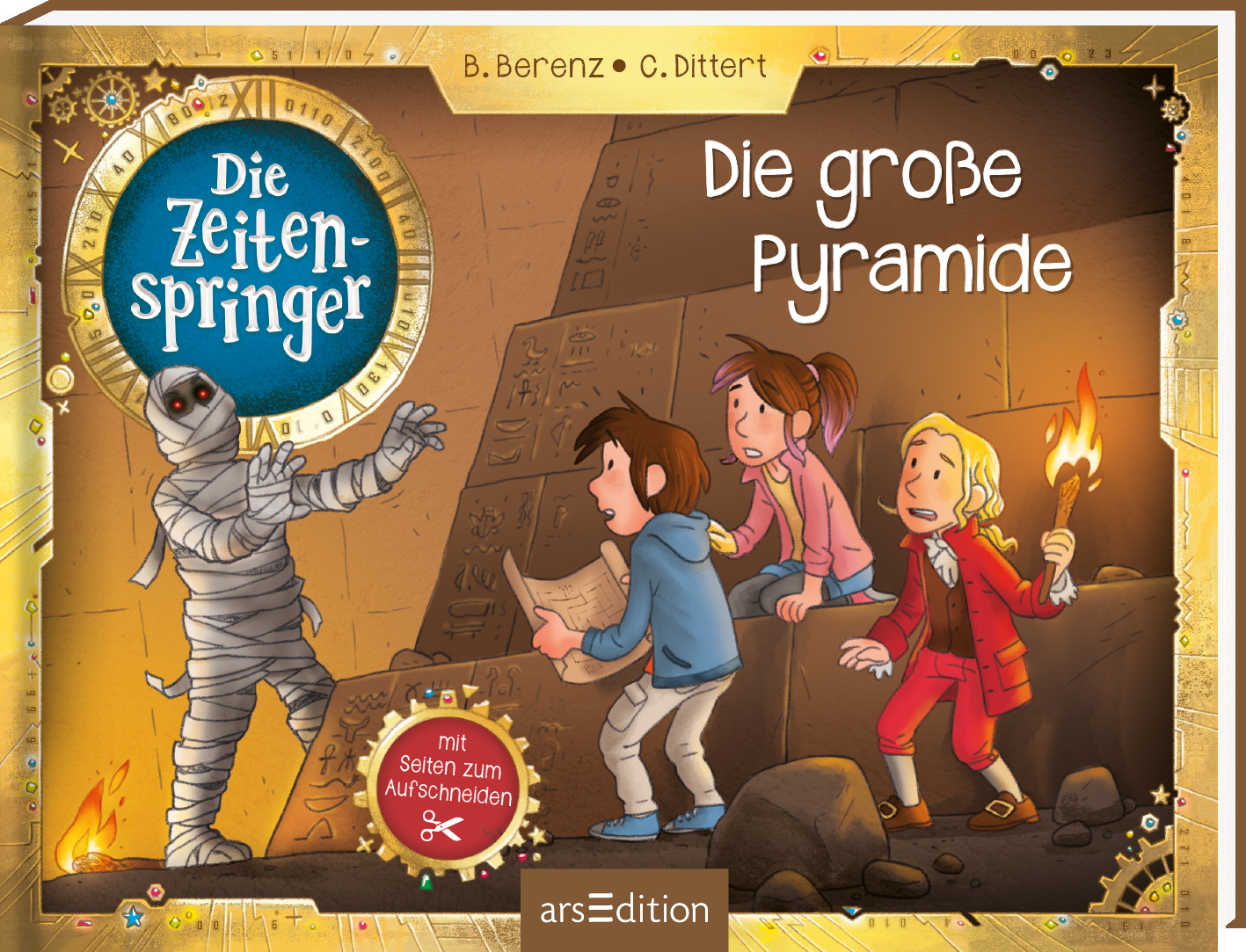 Das Buchcover zeigt eine lebhafte Szene aus einem Abenteuer mit zwei Kindern und einer mumifizierten Gestalt in einem mysteriösen Raum. Die Charaktere sind in bunten Kleidungen dargestellt: eine rothaarige Figur mit einer Fackel, ein Junge in hellem Shirt und ein Mumién-Motiv auf der linken Seite. Der Titel „Die großen Pyramide“ ist in spielerischer, weißer Schrift platziert, während der Hinweis „mit Seiten zum Aufschneiden“ unten steht. Oben links erscheint das Emblem „Die...