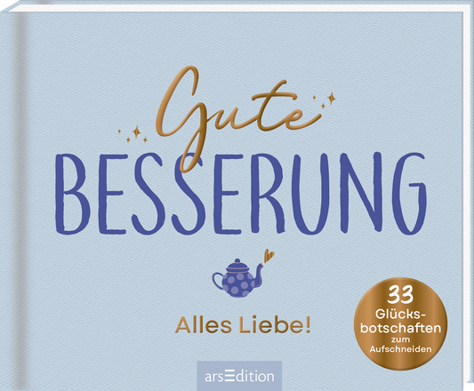 Das Cover zeigt einen hellblauen Hintergrund mit dem Titel „Gute Besserung“ in eleganter, goldener Schrift und dem Wort „BESSERUNG“ in kräftigem Blau. Darunter steht in kleinerer Schrift „Alles Liebe!“. Links unten ist eine stilisierte Teekanne in Blau abgebildet. Ein Button in Gold enthält den Text „33 Glücksbotschaften zum Aufschneiden“. Ganz unten mittig steht der Logoschriftzug von arsEdition.