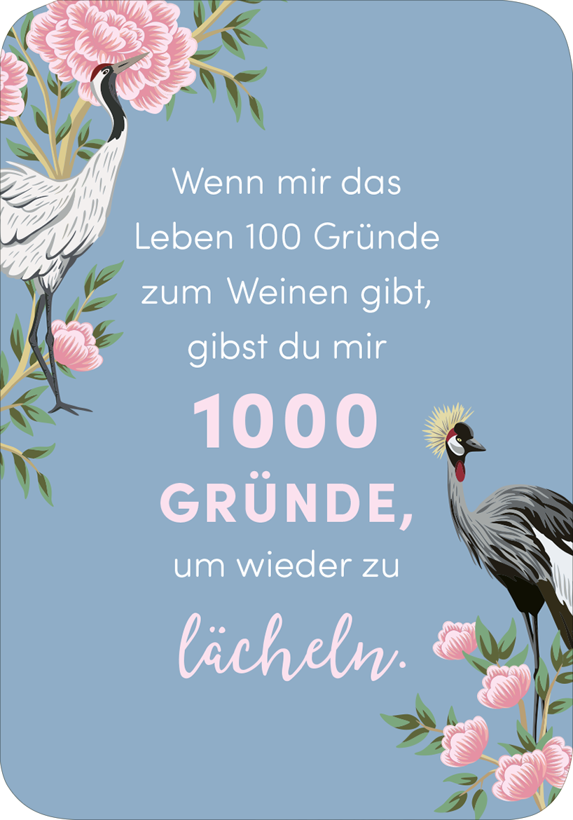 Gezeigt wird eine Innen- oder Zusatzansicht von „Weil du eine wundervolle Frau bist!“. Der Hintergrund ist in einem sanften Blau gehalten und mit rosa Pfingstrosen und stilisierten Kranichen verziert. Der Text ist in unterschiedlichen Schriftgrößen und -arten gestaltet: „Wenn mir das Leben 100 Gründe zum Weinen gibt,“ in einer eleganten, serifenlosen Schrift, und „1000 GRÜNDE, um wieder zu lächeln“ in einer größeren, verspielten Schriftart. Das Gesamtbild strahlt eine...