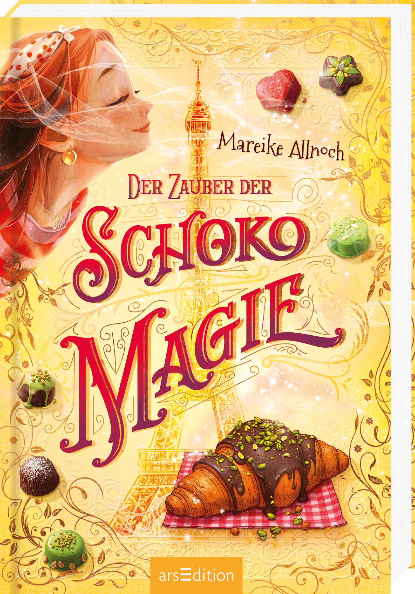 Das Cover zeigt ein Mädchen mit roten Haaren, das die Augen geschlossen hat und einen Duft zu riechen scheint. Zentral abgebildet ist der Eiffelturm und darum herum sind Pralinen und ein Pistatiencroissant abgebildet. Der Titel „Der Zauber der Schokomagie“ ist in verschnörkelter, roter Schrift gestaltet. Darüber steht der Name der Autorin Mareike Allnoch. Ganz unten mittig steht der Logoschriftzug von arsEdition.