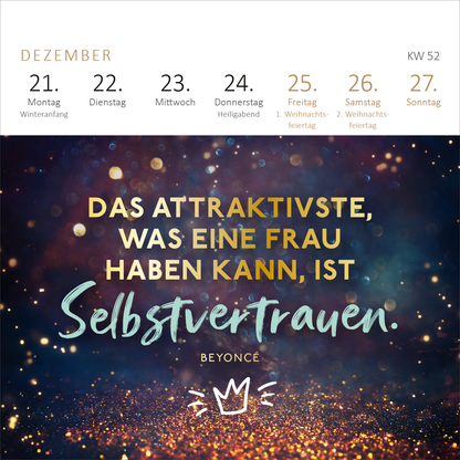 Gezeigt wird eine Innen- oder Zusatzansicht von „Mini-Wochenkalender Für eine tolle Frau wie dich 2026“. Die Darstellung zeigt einen festlichen Hintergrund mit funkelnden Lichtern in warmen Farbtönen. In der Mitte steht der hervorgehobene Text „Das attraktivste, was eine Frau haben kann, ist Selbstvertrauen.“ in einer Kombination aus goldener und blauer Schrift. Darunter befindet sich der Name „BEYONCÉ“ in einer eleganten Schriftart, ergänzt durch ein grafisches Detail in Form...