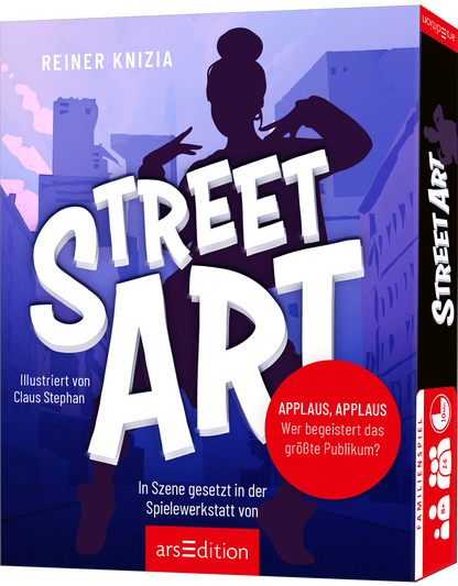 Cover zeigt eine dunkelviolette bis blaue Stadtsilhouette mit einer tanzenden schwarzen Scherenschnittfigur. Der Titel STREET ART ist groß, weiß und plastisch gesetzt, serifenlos und wuchtig. Autoren oben Reiner Knizia, Illustration von Claus Stephan. Roter Rundaufkleber mit der Aufschrift „APPLAUS, APPLAUS Wer begeistert das größte Publikum“ vermittelt urbanen, dynamischen, spielerischen Charakter. Ganz unten mittig steht der Logoschriftzug von arsEdition.