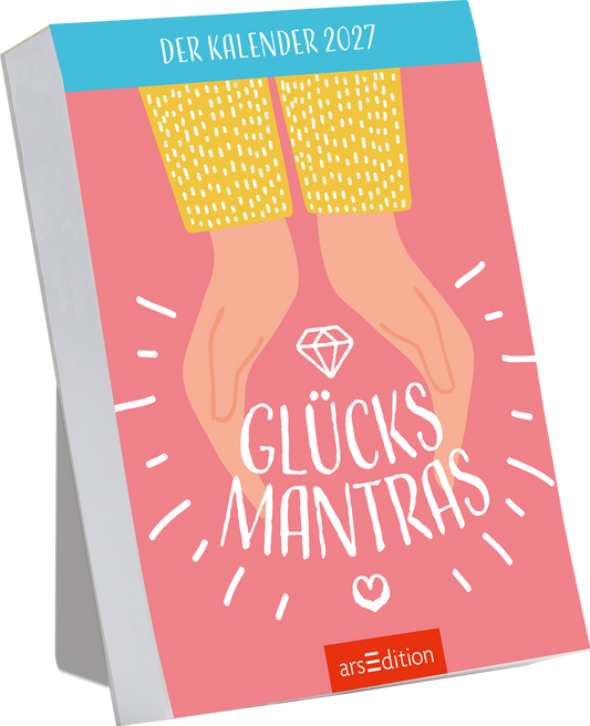 Das Buchcover zeigt einen sanften rosa Hintergrund mit zwei Händen, die einen Diamanten formen. Die Hände sind in leuchtendem Gelb gehalten und bilden einen warmen Kontrast. In der Mitte steht der Titel „GLÜCKSMANTRAS“ in großer, weißer Schrift, umgeben von stilisierten, fröhlichen Linien und einem Herz. Oben links findet sich der Schriftzug „DER KALENDER 2027“. Ganz unten mittig steht der Logoschriftzug von arsEdition.