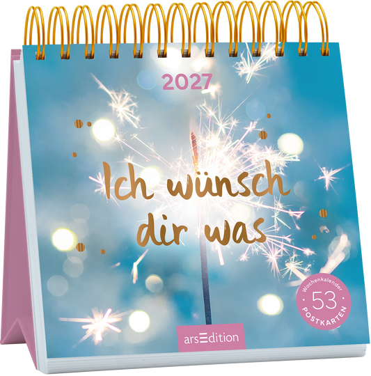 Das Buchcover zeigt einen spiralförmigen Kalender mit einem sanften, hellblauen Hintergrund, auf dem verschwommene Lichter funkeln. In der Mitte steht in eleganter, goldener Schrift „Ich wünsche dir was“. Oberhalb des Schriftzugs ist die Jahreszahl „2027“ platziert. Ein kleiner, rosa Button in der unteren rechten Ecke trägt den Text „53 Postkarten“. Ganz unten mittig steht der Logoschriftzug von arsEdition.