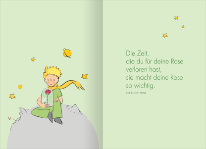 Gezeigt wird eine Innen- oder Zusatzansicht von „Buchkalender Man sieht nur mit dem Herzen gut 2027“. Die Doppelseite präsentiert den Monat Oktober mit einem klaren, strukturierten Layout. Links sind die Wochentage in grauer Schrift auf weißem Hintergrund angeordnet, dekoriert mit niedlichen, farbenfrohen Illustrationen eines kleinen Prinzen und eines roten Fuchses, die hin und wieder mit gelben Sternen umrahmt sind. Rechts befindet sich ein leeres, gepunktetes Notizfeld in sanften Farben.