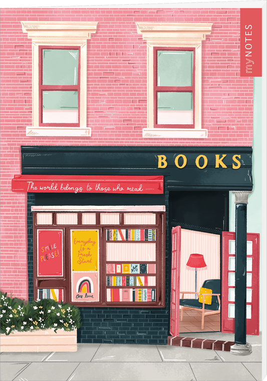 Das Buchcover zeigt eine einladende Buchhandlung mit einer hellrosa Fassade und einem schwarzen Eingangsbereich. Über dem Eingang steht in großen, goldenen Buchstaben „BOOKS“. Neben dem Eingang hängt ein rotes Schild mit der Aufschrift „The world belongs to those who read“. Im Schaufenster sind mehrere bunte Buchcover zu sehen, darunter ein gelber Titel und ein Bild mit einem Regenbogen. In der Buchhandlung steht eine rote Lampe. Ganz unten mittig steht der Logoschriftzug von...