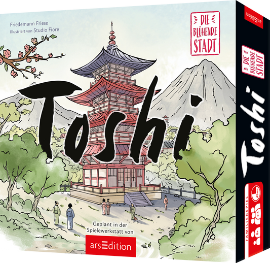 Cover zeigt eine rotweiße japanische Pagode vor pastellblauem Himmel und grauem Berg, umgeben von grünen Bäumen und einem Kirschblütenzweig. Großer schwarzer pinselartiger Titel Toshi überlagert das Bild. Kleine Figuren im Vordergrund vermitteln Ruhe. Oben rechts roter Stempel mit Schriftzug Die blühende Stadt. Autorennennung oben links Friedemann Friese, illustriert von Studio Fiore. Ganz unten mittig steht der Logoschriftzug von arsEdition.