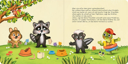 Gezeigt wird eine Innen- oder Zusatzansicht von „Der Baby Waschbär braucht keine Windel mehr“. Die Illustration zeigt lebendige, farbenfrohe Tiere im Spiel bei Tageslicht. Ein Waschbär mit neutralen Farben steht im Mittelpunkt, umgeben von einem kleinen Hund und einem Schildkröte. Die Schrift ist gut lesbar, in einer verspielten, kindgerechten Typografie. Der Hintergrund ist mit sanften grünen Tönen und bunten Blumen gestaltet, was eine fröhliche, einladende Stimmung vermittelt.