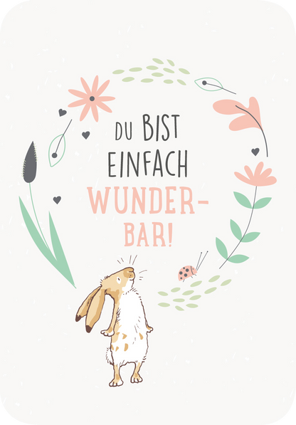 Gezeigt wird eine Innen- oder Zusatzansicht von „Weißt du eigentlich, wie lieb ich dich hab? Kleine Liebeserklärungen für jeden Tag“. Die Illustration zeigt einen niedlichen Hasen in der Mitte, umgeben von bunten Blumen und grünen Blättern. Der Haupttext „DU BIST EINFACH WUNDER-BAR!“ ist in großen, verspielten Buchstaben gehalten, wobei „WUNDER-BAR!“ in einem hellen Farbton hervorgehoben ist. Die gesamte Gestaltung vermittelt eine liebevolle und fröhliche Stimmung.