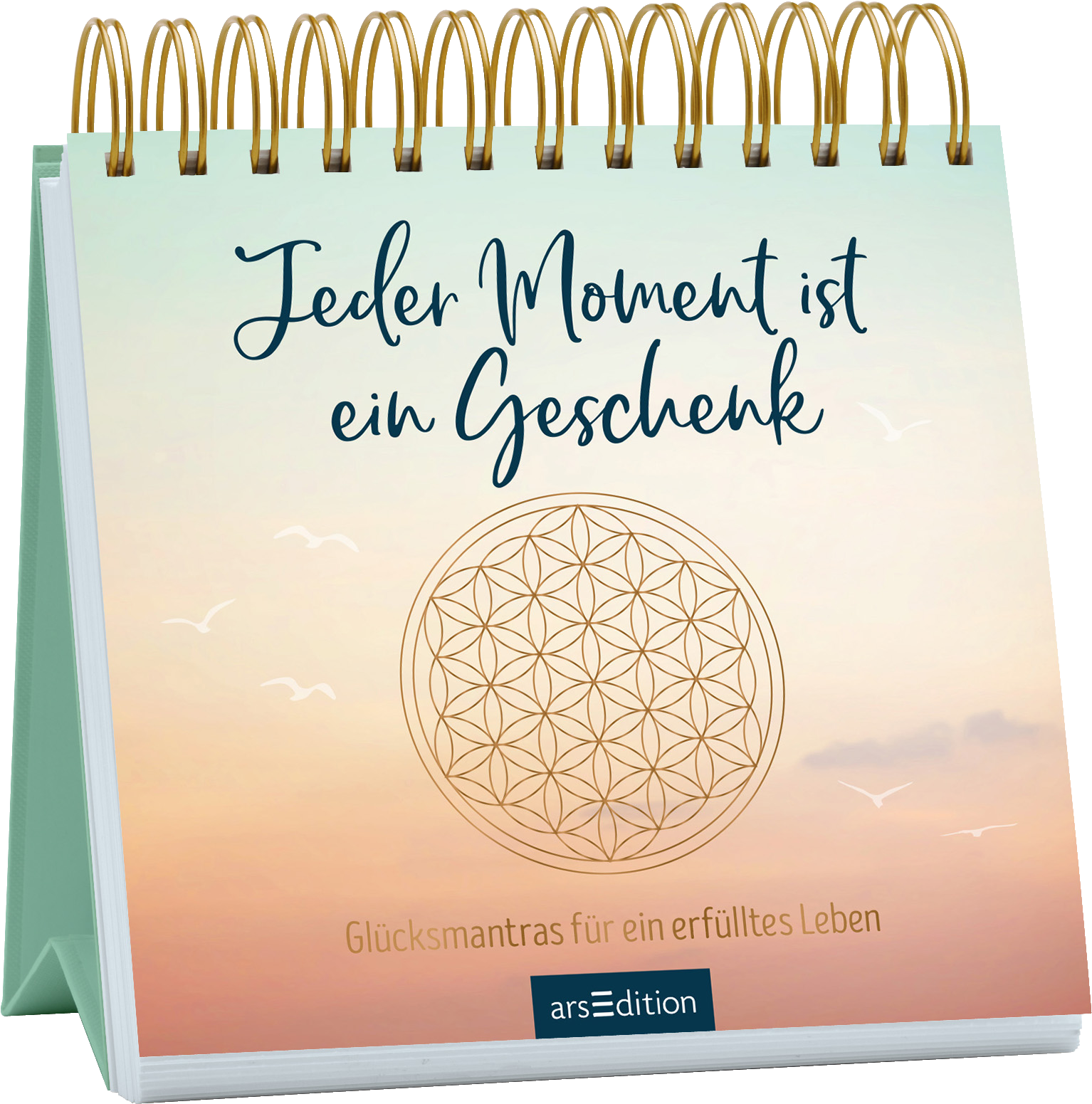 Das Buchcover zeigt eine sanfte Farbverlauf, der von einem hellen Türkis über ein zartes Rosa bis zu einem sanften Beige übergeht. In der Mitte steht in geschwungener blauer Schrift der Titel „Jeder Moment ist ein Geschenk“. Darunter befindet sich der Untertitel „Glücksmantras für ein erfülltes Leben“ in einer klaren, serifenlosen Schrift. Ein stilisiertes, kreisförmiges Motiv, das die „Blume des Lebens“ darstellt, ergänzt das Design. Ganz unten mittig steht der...