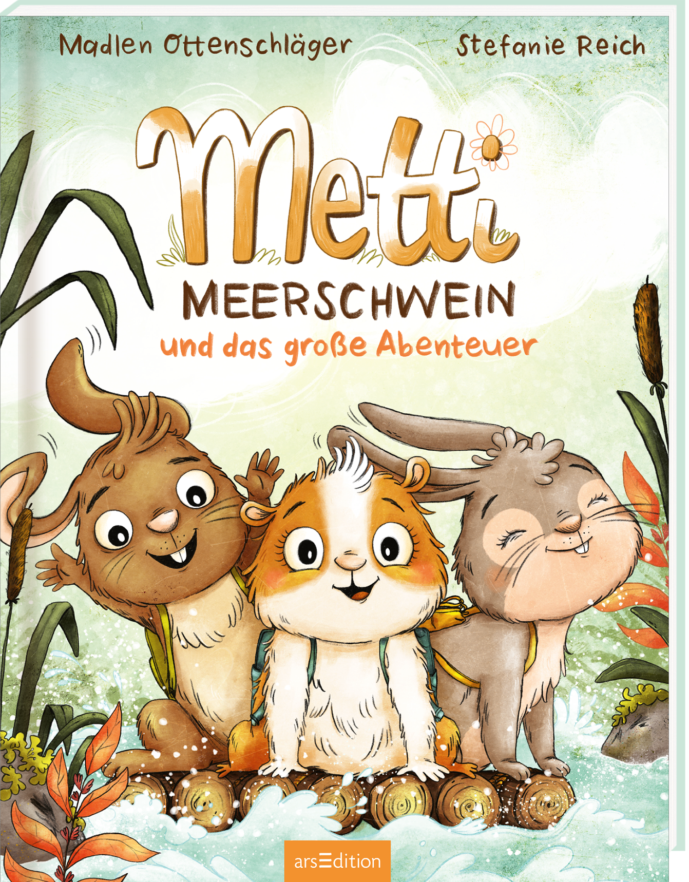 Das Buchcover zeigt die drei tierischen Freunde Metti, ein Meerschweinchen, sowie einen Hasen und ein weiteres Tier, die fröhlich am Ufer eines Gewässers stehen. Die Farben sind hell und freundlich, mit sanften Grüntönen und Erdtönen dominiert. Der Titel „Metti Meerschwein und das große Abenteuer“ ist in verspielter, leicht geschwungener Schrift oben platziert. Eine aufgemalte Blume unterstreicht die Abenteuerlust. Ganz oben links befindet sich ein „SPIEGEL Bestseller“-Button....