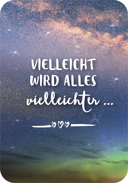 Gezeigt wird eine Innen- oder Zusatzansicht von „Glücksorakel für jede Lebenslage“. Der Hintergrund zeigt einen prachtvollen Sternenhimmel in Blau- und Lilatönen, der mit goldenen Glitzerpartikeln durchzogen ist. Zentral steht der Spruch „Vielleicht wird alles vielleicht leichter ...“ in einer verspielten, geschwungenen Schrift, die vor den funkelnden Sternen hervortritt. Die Kombination aus sanften Farben und freundlicher Typografie vermittelt eine positive Stimmung.