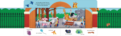 Gezeigt wird eine Innen- oder Zusatzansicht von „Schau rein! Was ist denn hier los?“. Die Szene zeigt einen bunten Zoo mit verschiedenen Tieren, darunter eine Giraffe und ein Elefant, umgeben von grünen Bäumen und einem Zaun. Menschen interagieren mit den Tieren und genießen einen Verkaufsstand. Die Hauptfarben sind lebhaft und freundlich, mit Akzenten in Blau, Grün und Braun. Die Typografie ist klar und kindgerecht gestaltet, mit einer Frage, die zur Entdeckung einlädt.