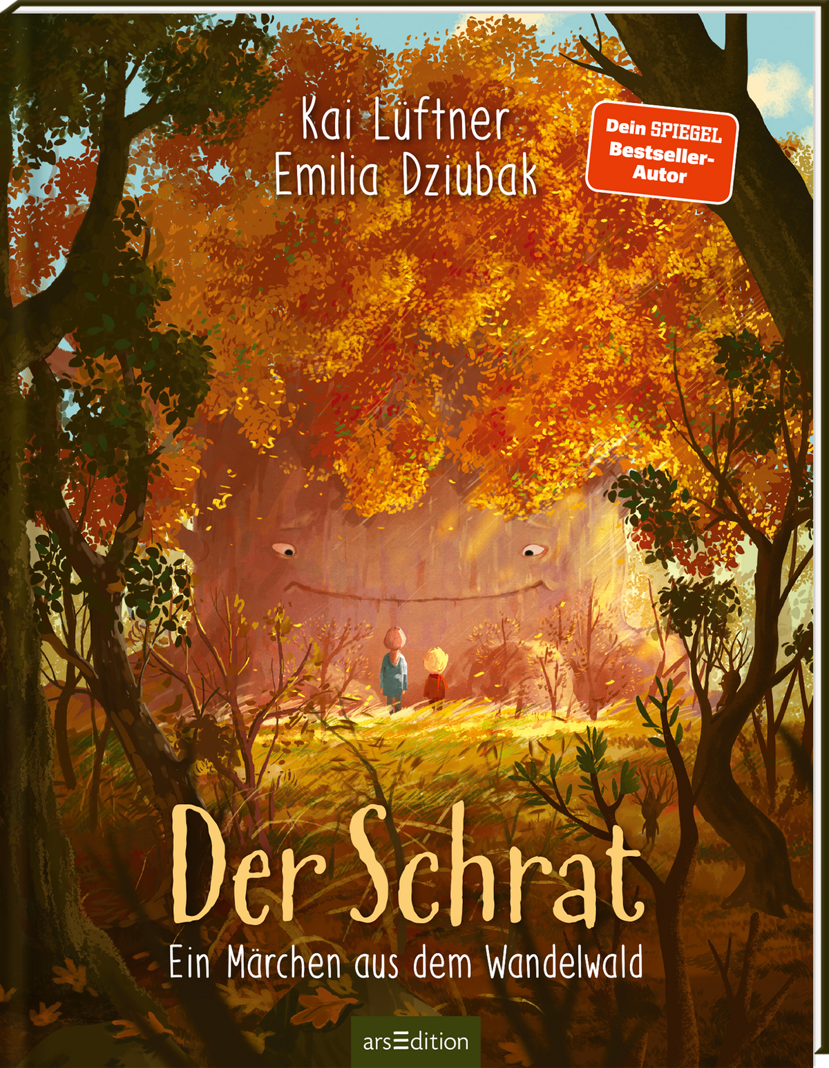 Auf dem Buchcover ist eine märchenhafte Waldlandschaft mit bunten, herbstlichen Blättern in warmen Gelb- und Orangetönen zu sehen. In der Mitte steht ein großer Baum mit lächelndem Gesicht, umgeben von zwei Kindern, die neugierig auf ihn blicken. Der Titel „Der Schrat“ ist in geschwungener Schrift geschrieben, und der Autor Kai Lüftner und die Illustratorin Emilia Dziubak sind oben im Bild platziert. Oben rechts ist ein roter Button mit dem Text „Dein SPIEGEL Bestseller-Autor“ zu...