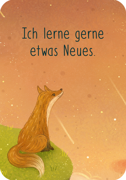 Gezeigt wird eine Innen- oder Zusatzansicht von Affirmationskarten. Die Karte zeigt einen stilisierten Fuchs, der auf einer grünen Wiese sitzt und in den Himmel blickt. Der Hintergrund ist in sanften Pastelltönen gehalten, mit einem Verlauf von Orange zu Rosa. Der Text „Ich lerne gerne etwas Neues.“ ist in einer freundlichen, handschriftähnlichen Schriftart oben auf der Karte platziert und hebt sich durch den Kontrast zur Hintergrundfarbe ab.