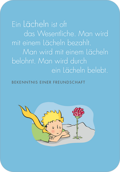 Gezeigt wird eine Innen- oder Zusatzansicht von „Man sieht nur mit dem Herzen gut. Weihnachtswünsche für dich“. Der Hintergrund ist in einem sanften Blau gehalten, auf dem ein knieender, cartoonartiger Junge mit gelben Haaren und einem grünen T-Shirt zu sehen ist. Er betrachtet eine rote Blume. In großen weißen Buchstaben sind Textzeilen zu einem Lächeln zu lesen, gefolgt von dem Satz „BEKENNTNIS EINER FREUNDSCHAFT“ in kleinerer Schrift. Der verspielte Stil vermittelt eine...