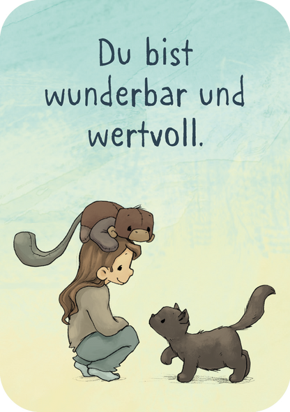 Gezeigt wird eine Innenansicht von „Anouk – Mutmachkarten“. Oben auf der Karte steht „Du bist wunderbar und wertvoll.“. Darunter ist eine Illustration eines Mädchens, das in der Hocke sitzt. Auf ihrem Kopf sitzt ein Kuscheltieraffe und eine schwarze Katze kommt auf sie zugelaufen.