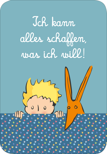 Gezeigt wird eine Innen- oder Zusatzansicht von „Der Kleine Prinz Mutmachkarten“. Auf der Karte ist ein Junge mit blonden Haaren abgebildet, der hinter einer bunten, sternenübersäten Stoffkante hervorschaut. Neben ihm steht eine orangefarbene Schere. Der Hintergrund ist in sanftem Himmelblau gehalten. Der Text in geschwungener Schrift besagt: „Ich kann alles schaffen, was ich will!“ und ist in Weiß gehalten.